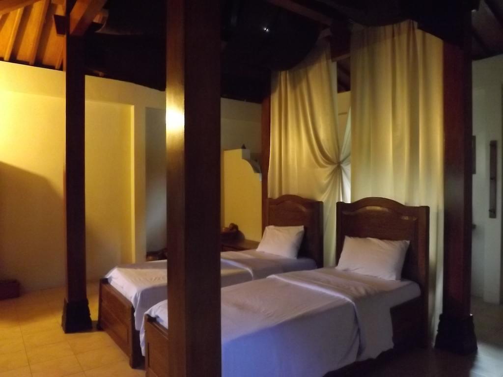 Rumah Dharma มาเกอลัง ห้อง รูปภาพ